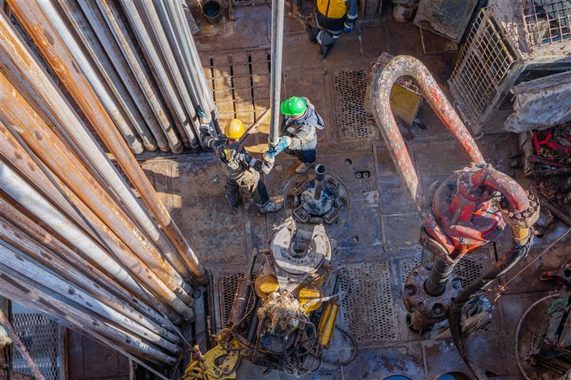 A worker operating oil rig